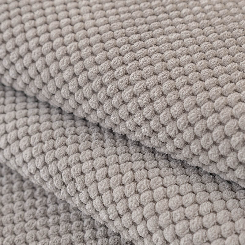 Copertura per divano in peluche di colore solido semplice.